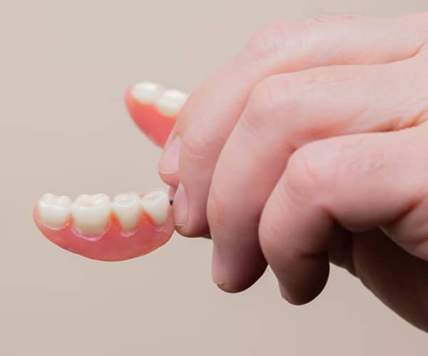 Snapin dentures Dental Implants at the cost of Dentures